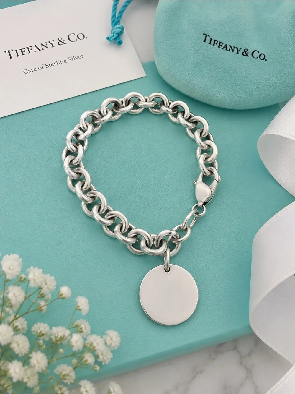 Authenticated Tiffany & Co. Return to Tiffany Round Charm Bracelet Silver 7.5”